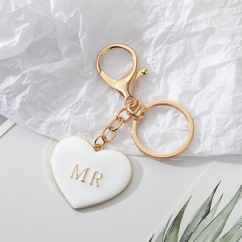 Wholesale Alloy Black and White Peach Heart Drip Oil Letter MrMrs Keychains